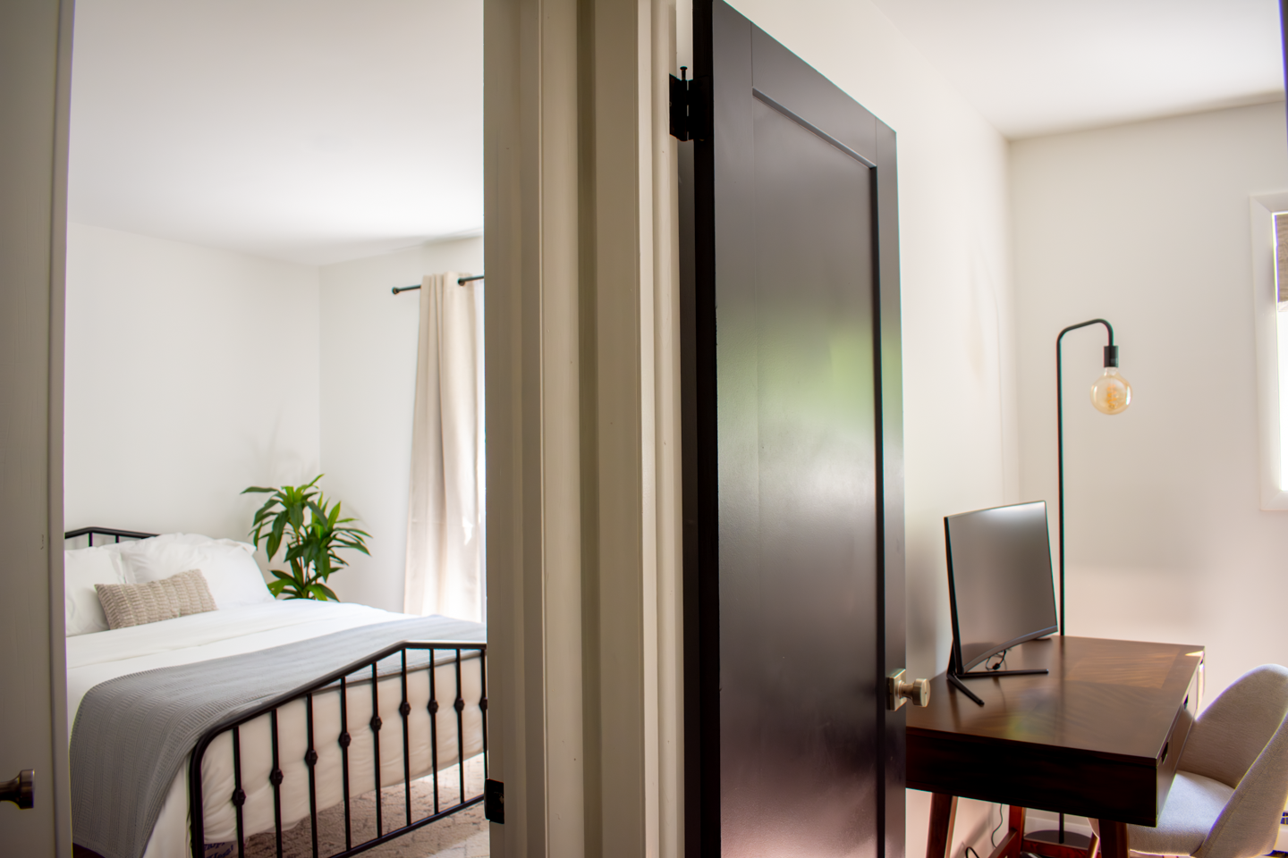 Photo showcasing view from the halway of both second and third bedrooms.